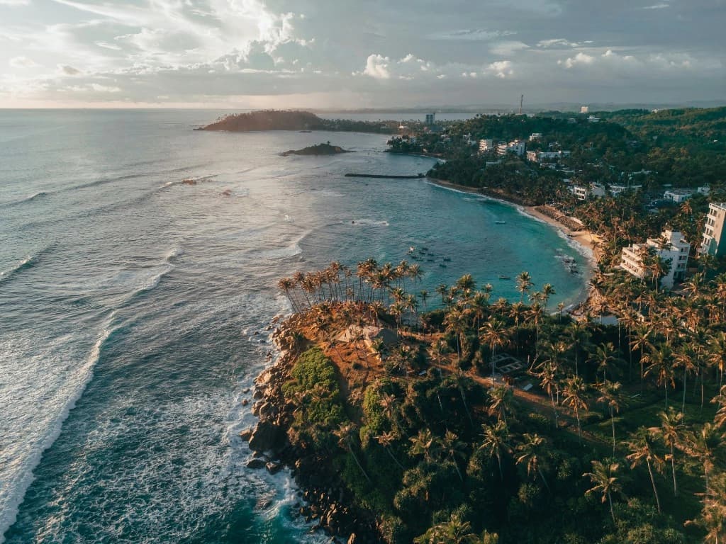 Sigiriya — Aerial view of Sri Lanka's south coast beach and turquoise shallows